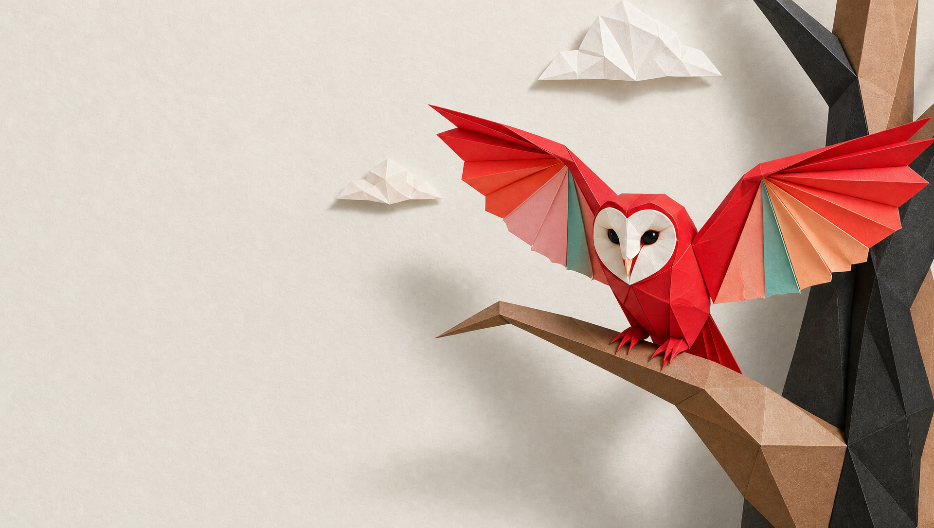 De rode origami-uil van rothDesign op een papieren tak